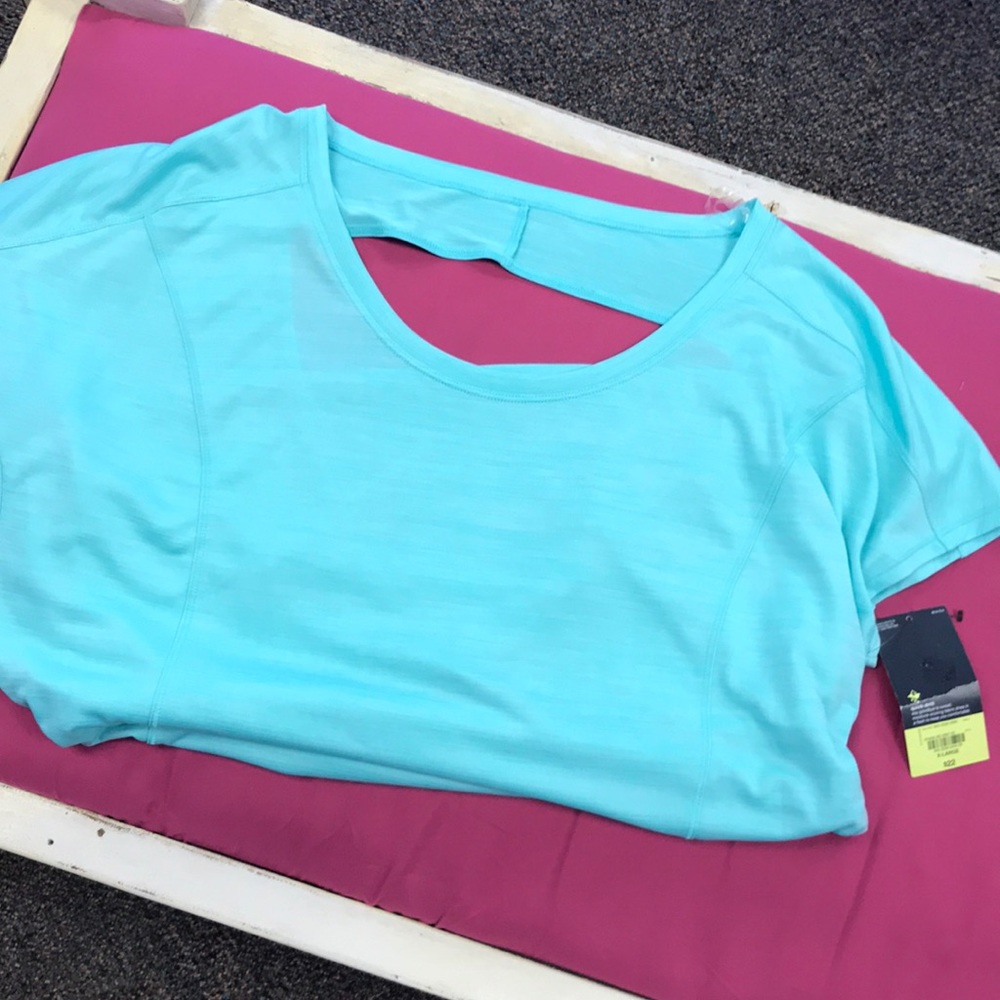 Active wear top. Light green more like turquoise